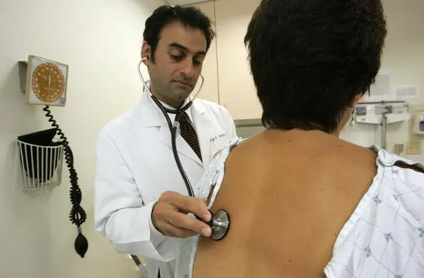 Doctor Examining Patient